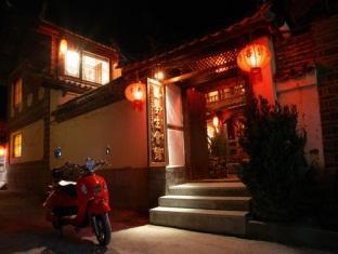 Готель Lijiang Overseas Club Екстер'єр фото