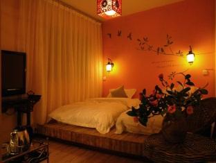 Готель Lijiang Overseas Club Екстер'єр фото