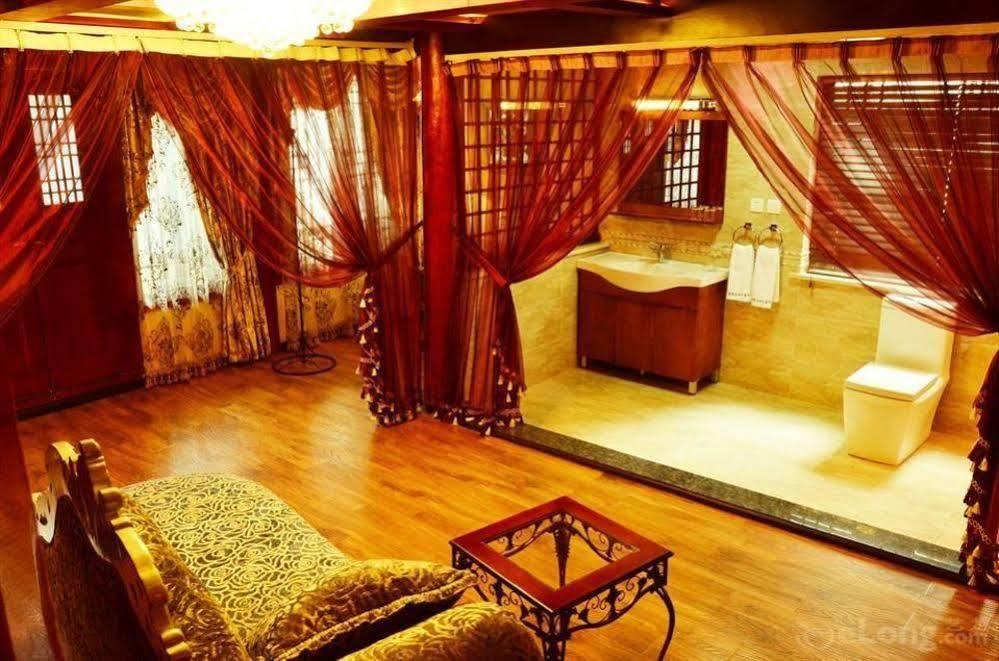 Готель Lijiang Overseas Club Екстер'єр фото