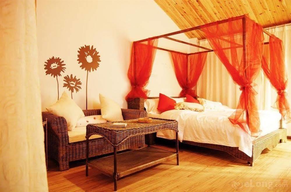Готель Lijiang Overseas Club Екстер'єр фото