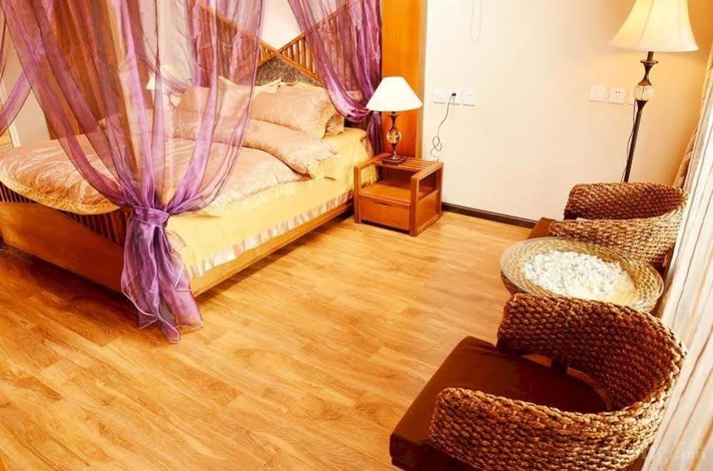Готель Lijiang Overseas Club Екстер'єр фото