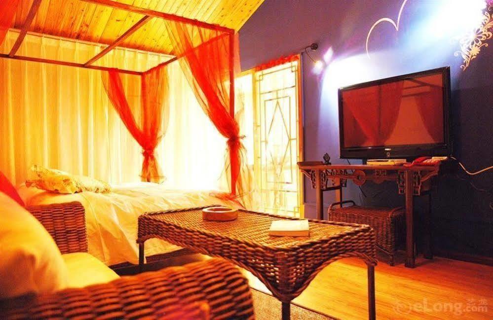 Готель Lijiang Overseas Club Екстер'єр фото